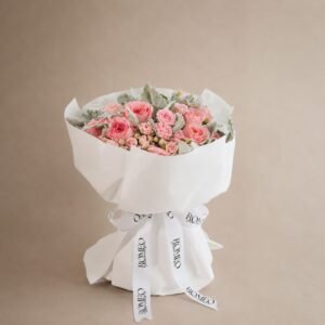English garden pink roses with dusty miller leaves bouquet by Romeo Flower Boutique